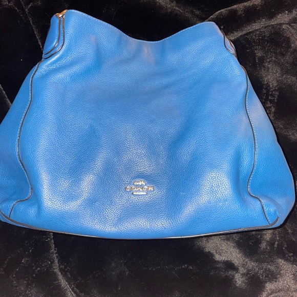 The Coach Edie bag soft slouchy silhouette style with functional design. - Picture 2 of 13